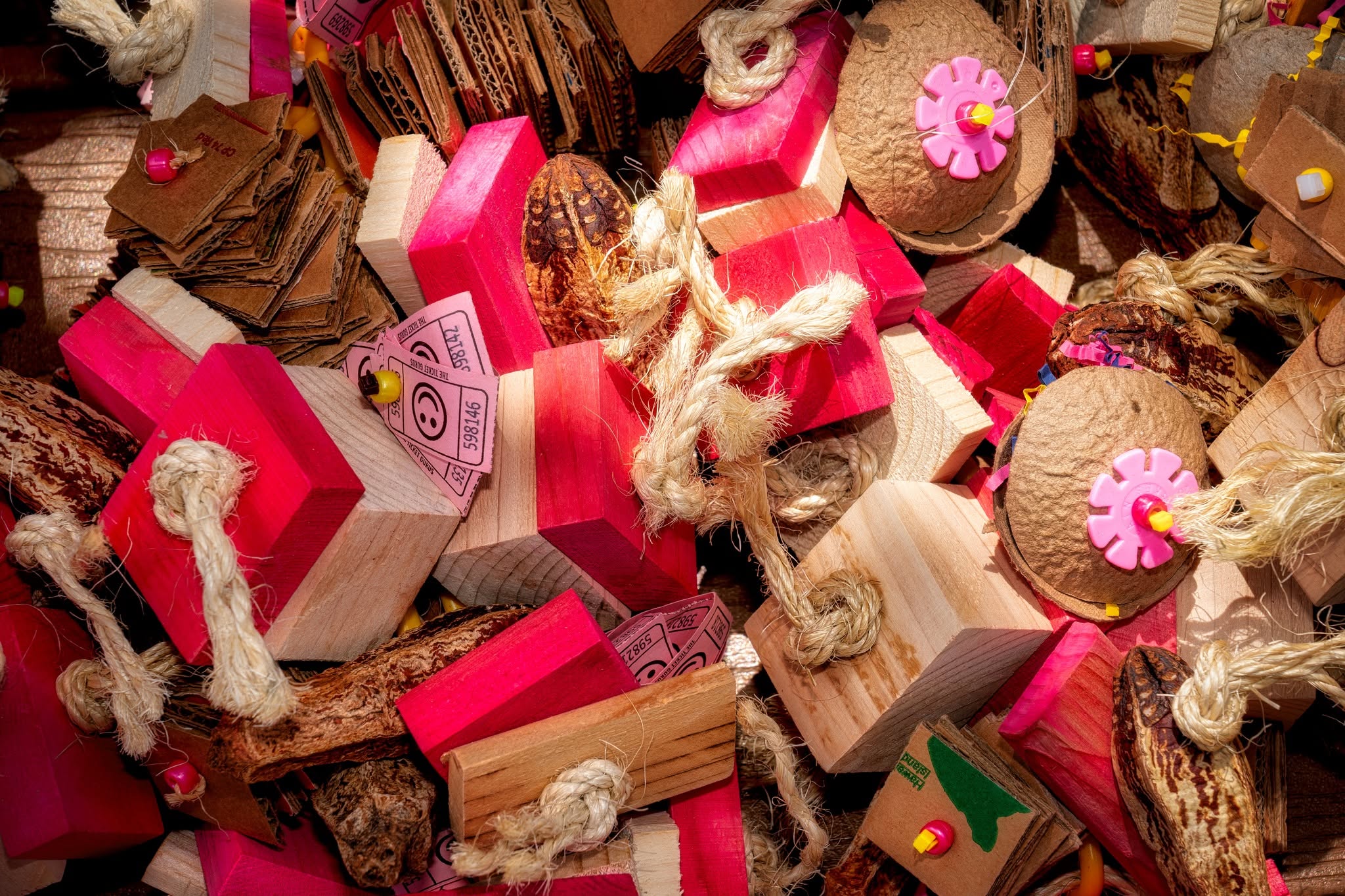Pile of handcrafted bird toys made with donations from Griffi the Dancing Cockatoo for the Maui wildfire relief effort